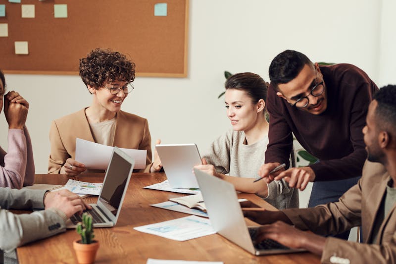 Modern real estate professionals using digital tools